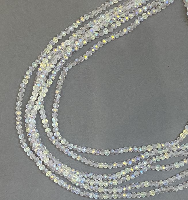 Koraliki czeskiego kryształu na żyłce, biały, przezroczysty, z benzynowym napylaniem, fasetowany rondel, średnica 3,5×3 mm, długość 33 cm