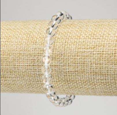 Bransoletka z górskiego kryształu — gładka kulka, średnica 6,5 mm, długość 18 cm, elastyczna