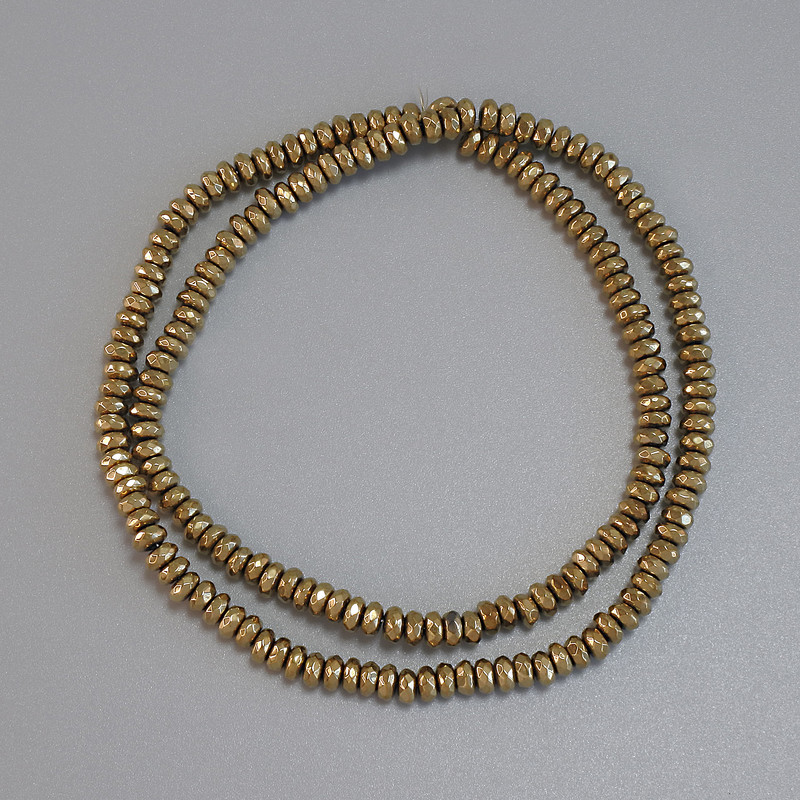 Koraliki hematitu złociste fasetowane rondelki 4x2 mm+- na żyłce, długość 38 cm+