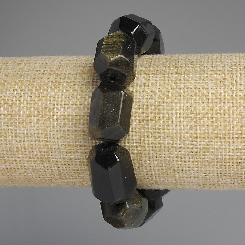 Bransoletka z naturalnego kamienia — Słoneczny obsydian, fasetowane kamienie, średnica 20×15–16 mm, długość 18 cm