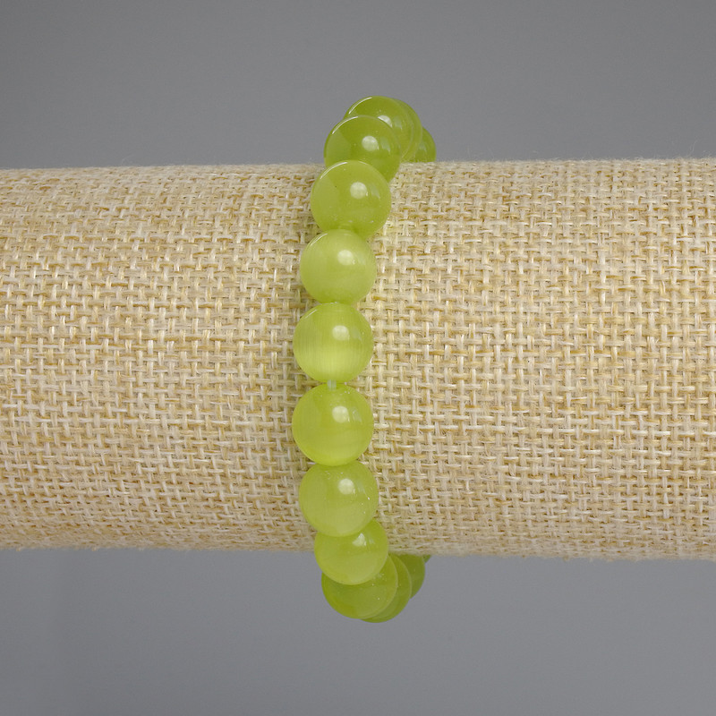 Bransoletka z kamieniem kocie oko, gładkie kulki o średnicy 9 mm, długość 18 cm, elastyczna