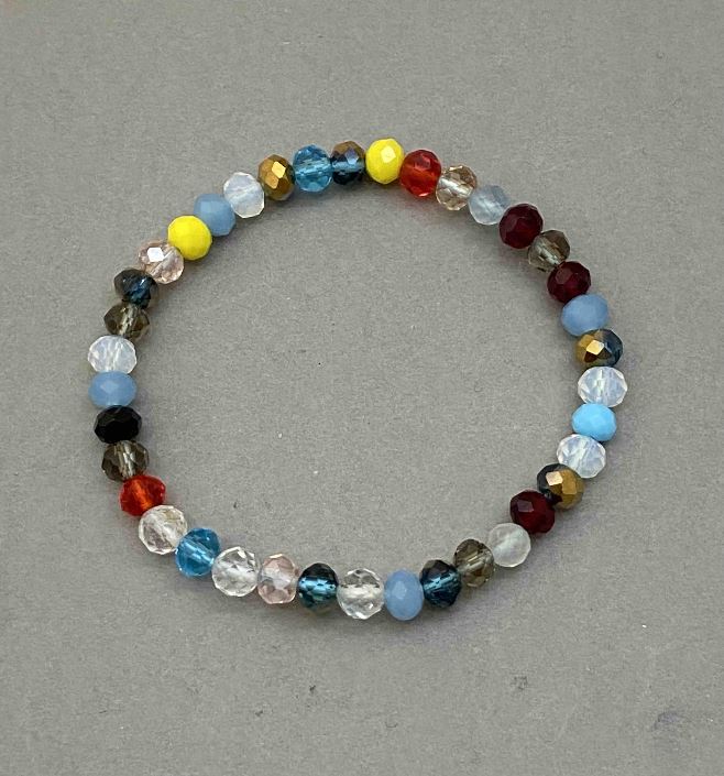 Bransoletka z czeskiego kryształu Asorti, fasetowane rondelki, średnica około 6×5 mm, długość 18 cm, elastyczna