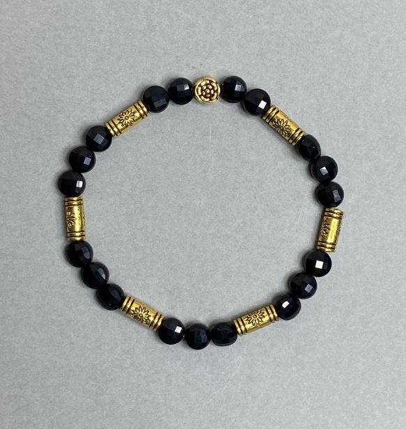 Bransoletka z turmalinem w formie fasetowanych monetek, 6 mm ± z metalowymi wstawkami, długość 18 cm, elastyczna