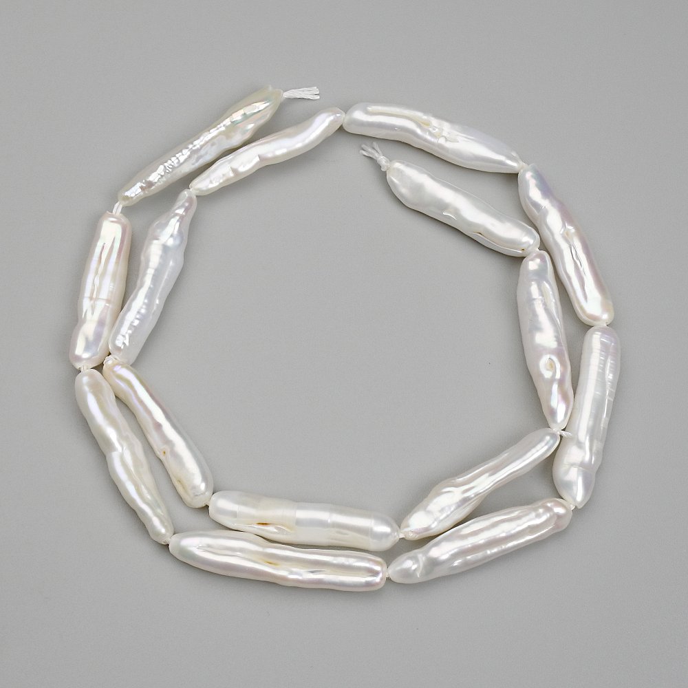 Barokowe perły na nitce z odcieniem „benzynowy” 24-25×5-5, 5 mm +-, długość 39 cm+