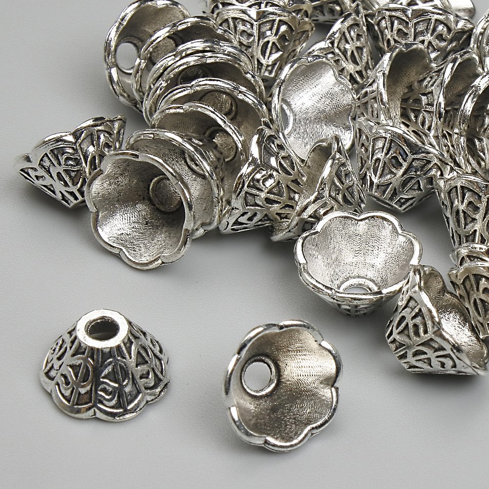 Końcówka do okuć, średnica 6×9 mm, otwór 2,2 mm, srebrzysty kolor metalu, opakowanie 20 g (~40 szt.)