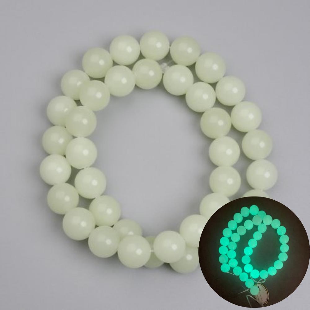 Koraliki onyksu z zielonym połyskiem – gładkie kuleczki 10 mm, długość 37 cm ± na żyłce