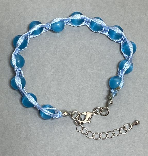 Bransoletka z kamieniem kocie oko, gładkie kulki o średnicy 8 mm, długość 18 cm + 5 cm łańcuszka przedłużającego