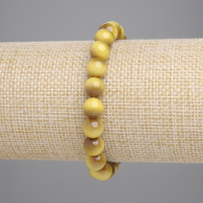 Bransoletka z tygrysiego oka — gładkie kuleczki, średnica około 8 mm, długość 18 cm, elastyczna (stretch)