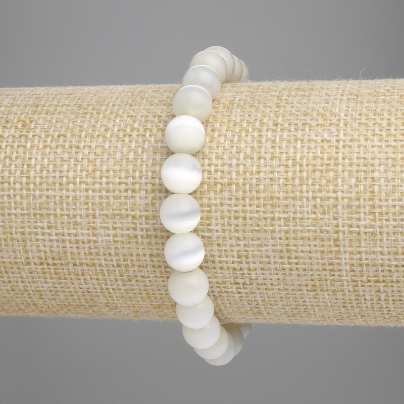 Bransoletka z syntetycznego kamienia „Kocie oko” (syntetyczne) – gładkie kuleczki, średnica około 8 mm, długość około 18 cm, elastyczna