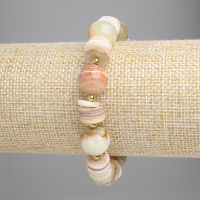 Bransoletka z onyksu, gładka kulka 12 mm +-, koraliki w kształcie rondelka o średnicy 10×2 mm +-, hematyt 3 mm +-, długość 18 cm +-, na elastycznej bazie