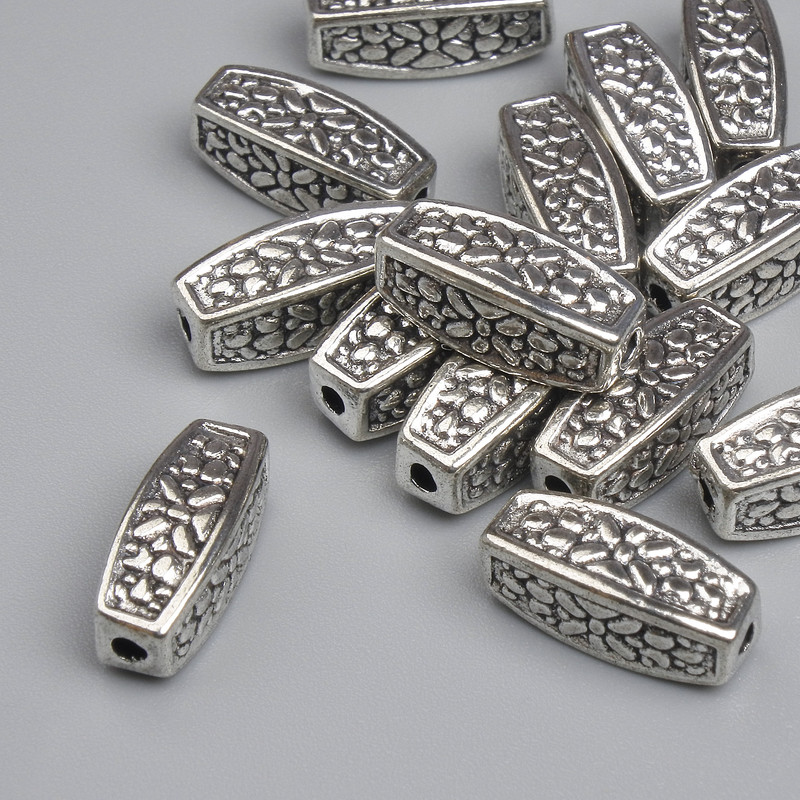 Wstawka koralikowa, kolor metalu: srebrny, wymiary 12,5×5 mm ± otwór 2 mm ± opakowanie ~14 szt.