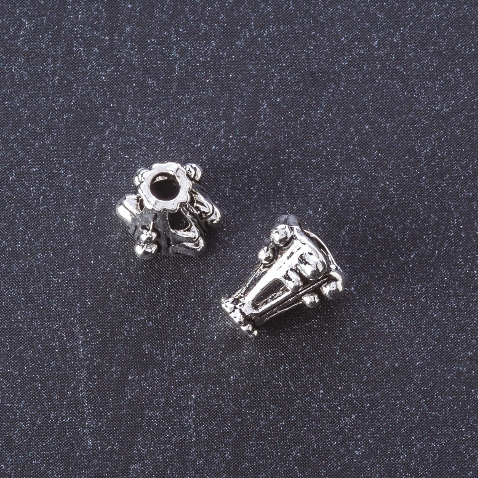 Końcówka do biżuterii, kolor metalu "srebro", długość 10 mm, opakowanie 20 g +/- 24 szt.