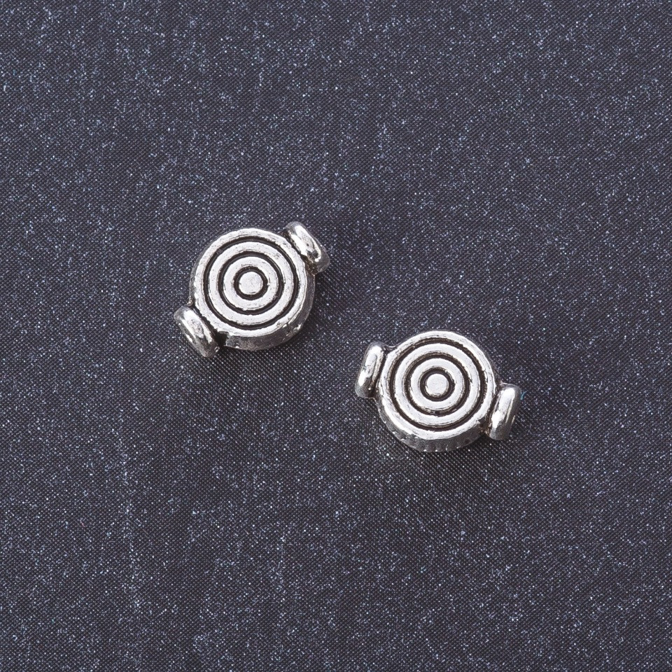 Furnitura – koralik-wstawka w kolorze metalu 'srebro' 8×10 mm, opakowanie 20 g, +/- 26 szt.