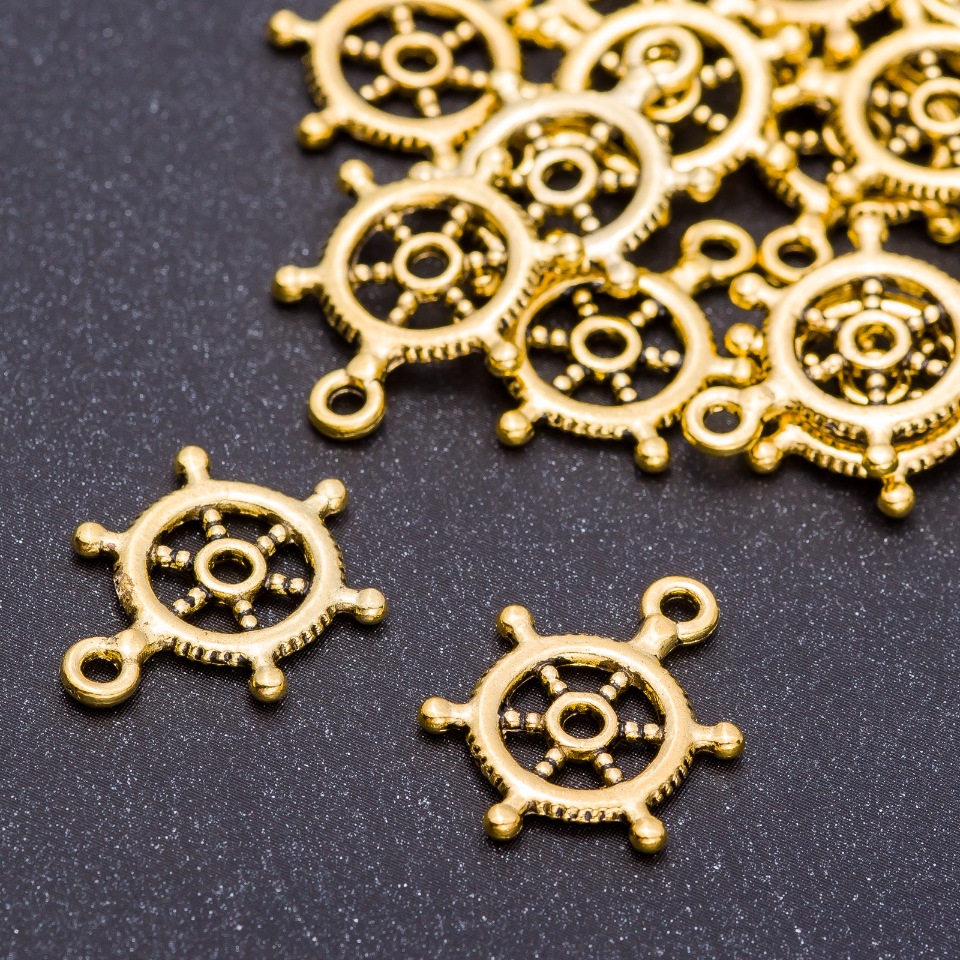 Zawieszka «Koło sterowe», średnica 15 mm, długość 20 mm, średnica otworu 5 mm, opakowanie 20 g ± 21 szt.