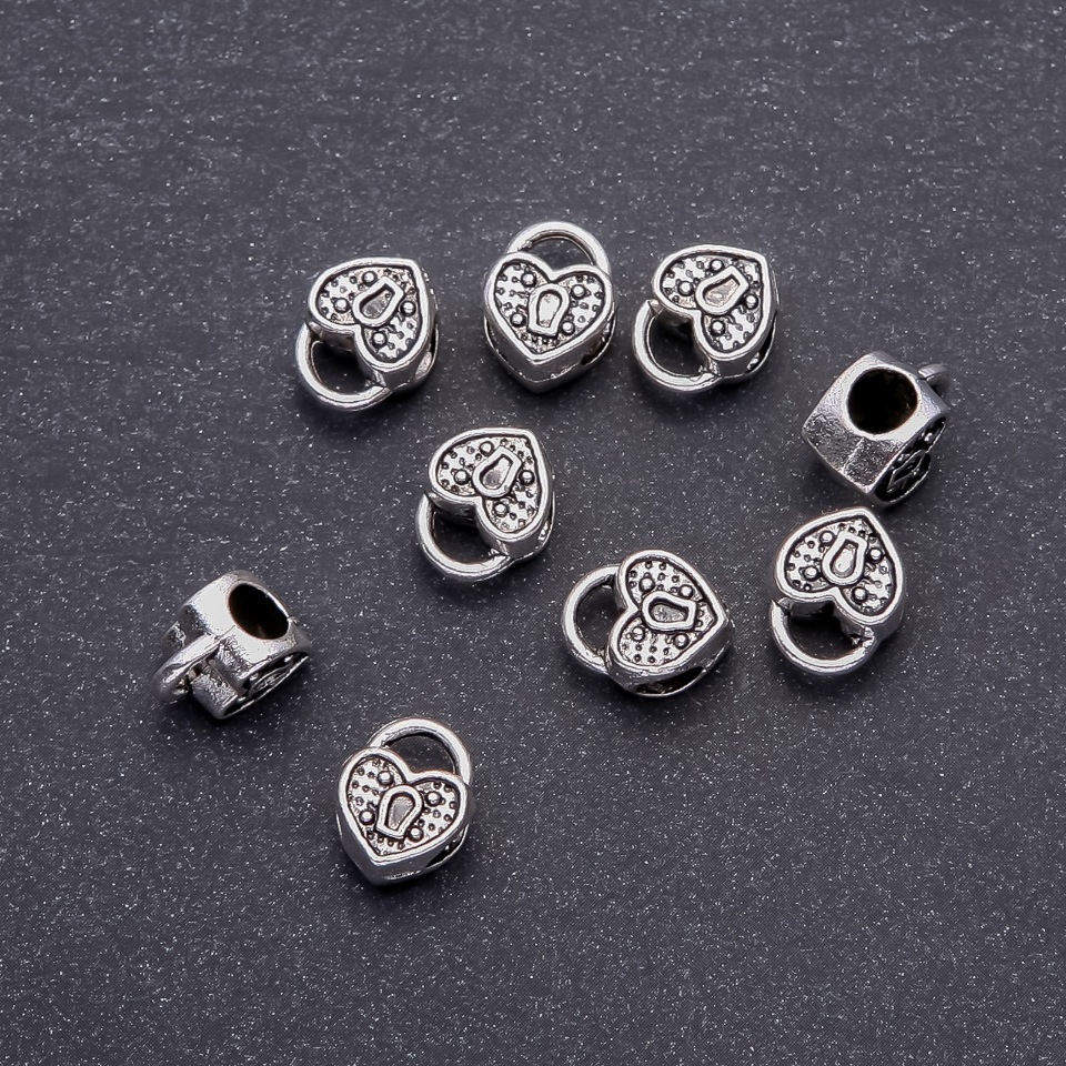Koralik wstawka Serce Pandora, średnica 10×12 mm, średnica otworu 4,8 mm, opakowanie 20 g ±9 szt.