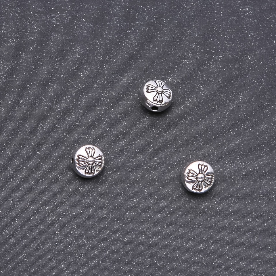 Koralik-wstawka w kształcie krzyża 8 mm, 20 g ± 17 szt.