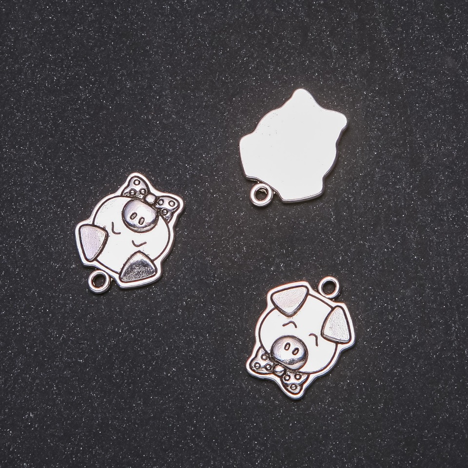 Zawieszka – Świnka 16×20 mm, opakowanie 20 g ±9 szt.