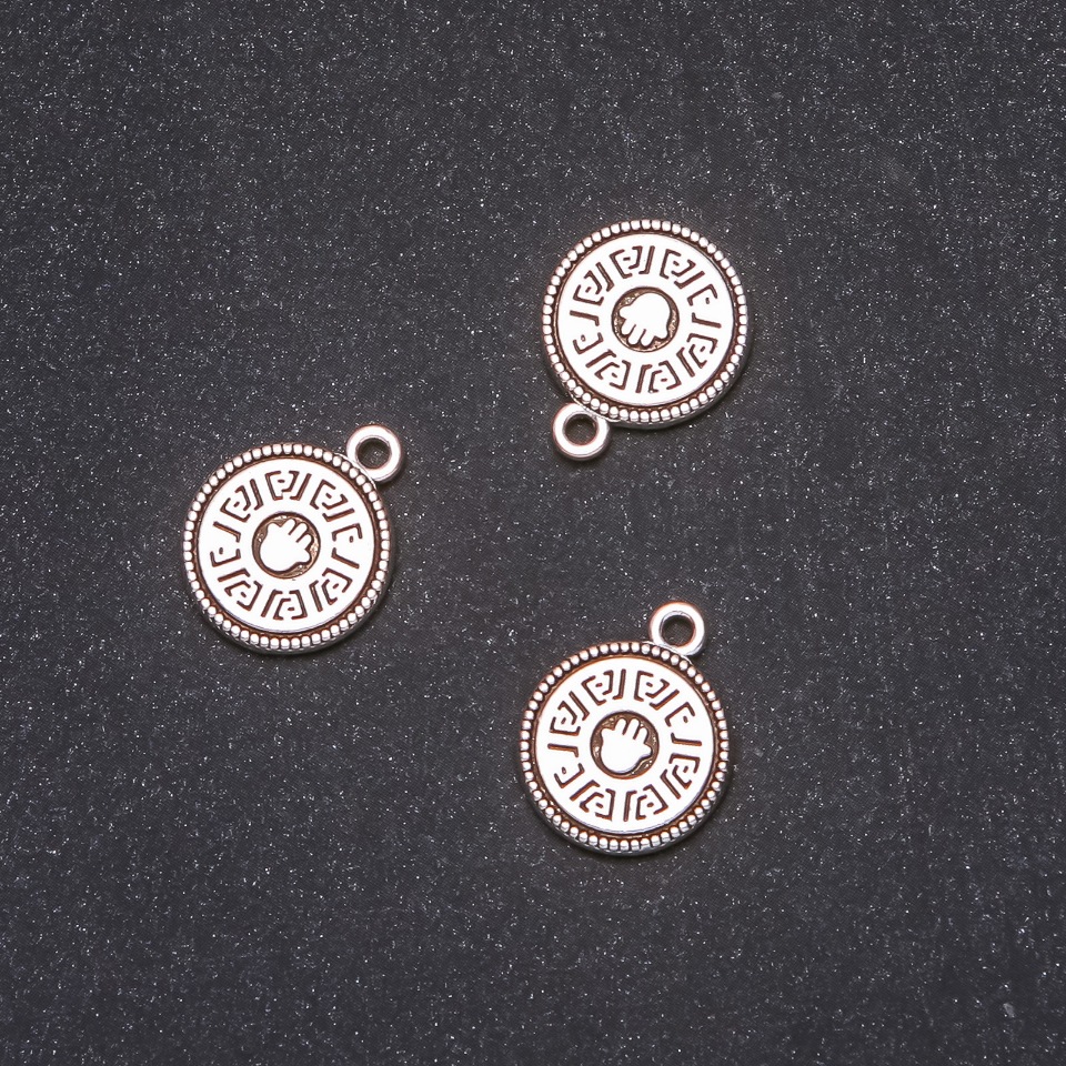 Zawieszka jubilerska „Moneta dłoni” 15×18 mm, opakowanie 20 g, +/- 9 sztuk