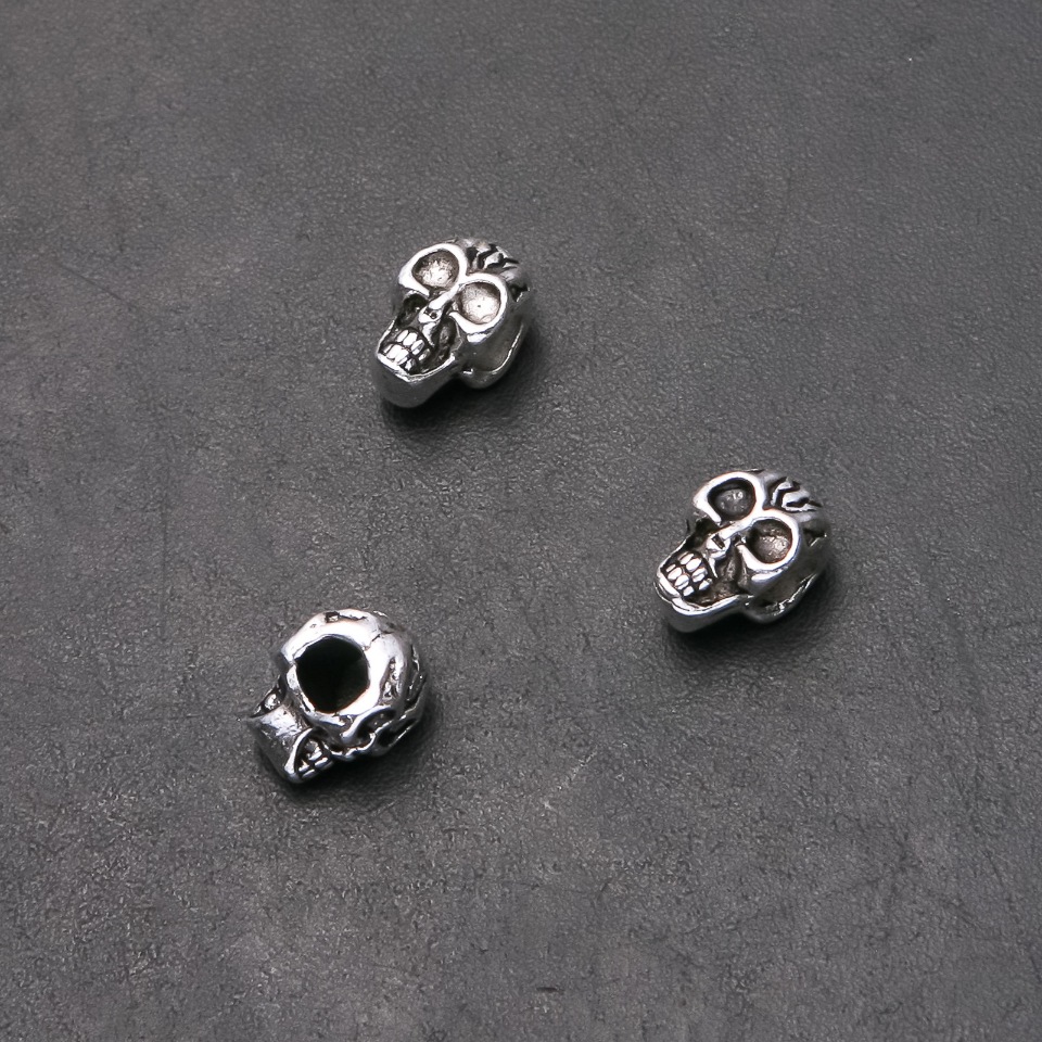 Czaszka Pandora – element ozdobny, średnica 8 mm, średnica 4,5 mm, długość 12 mm, opakowanie 20 g, 9 szt. (±)