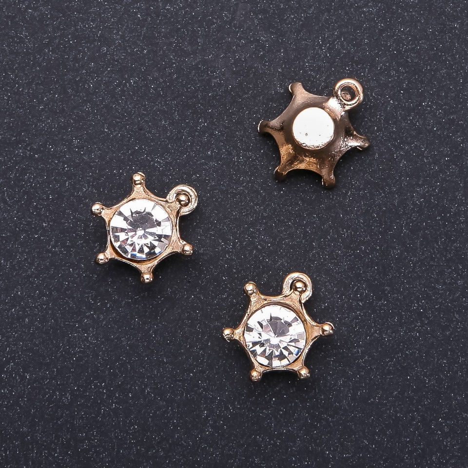 Zawieszka Korona 'złoto' z kryształem, średnica 16 mm, długość 18 mm, opakowanie 8 szt. (+ -)