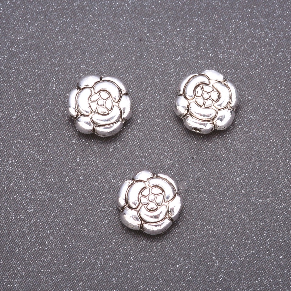 Koralik-wstawka d11×5 mm, średnica wewnętrznego otworu 4 mm, fasetowany, 20 g ± 10 szt