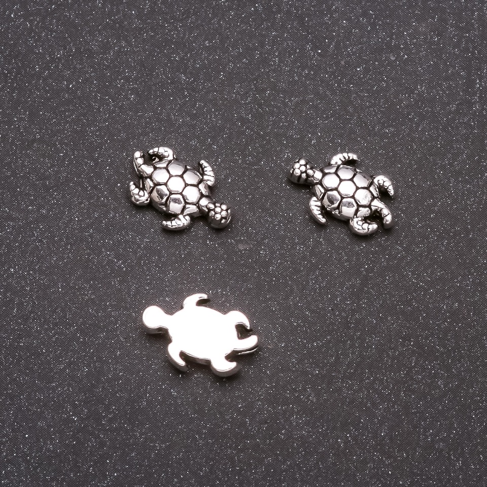 Koralik-wkładka «Żółw», średnica 13×9 mm, średnica wewnętrzna 1 mm, opakowanie 20 g ± 23 szt.