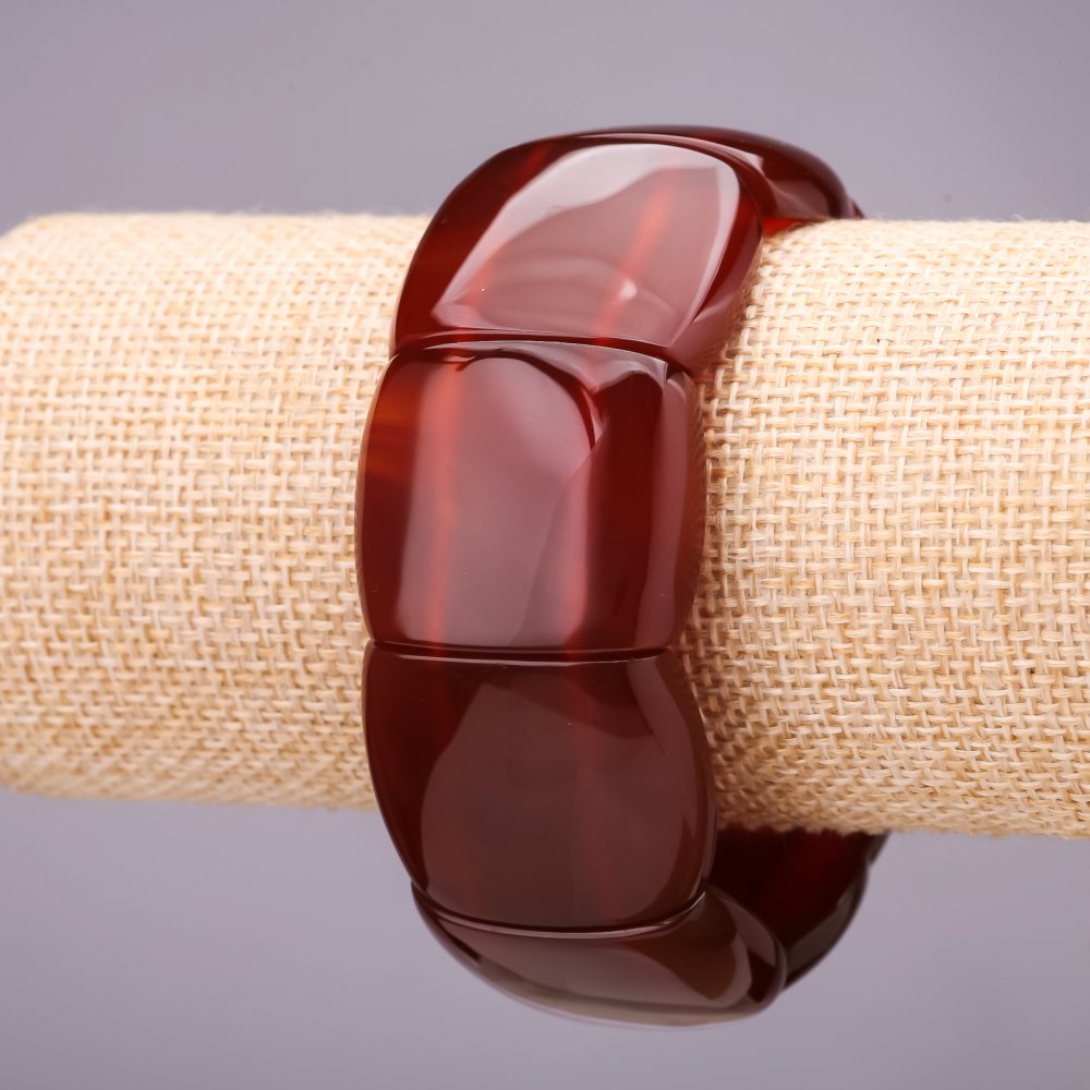 Bransoletka na gumce z naturalnego karneolu, gładkie ogniwa 30×25 mm, ± obwód 18 cm