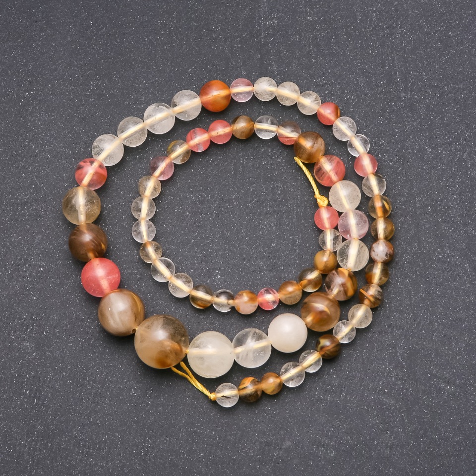 Koraliki z chalcedonu, gradujące, gładkie kuleczki o średnicach od 6 do 14 mm, długość 44 cm