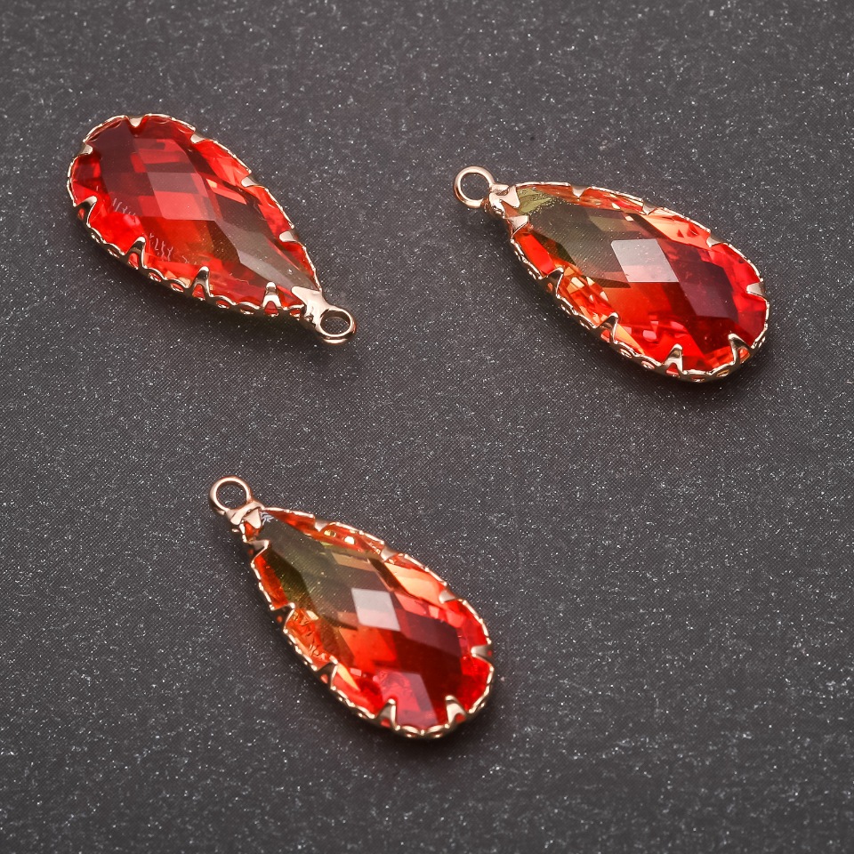 Wisiorek „Kropla” w kolorze żółto-pomarańczowym, oprawa złota 10×24 mm