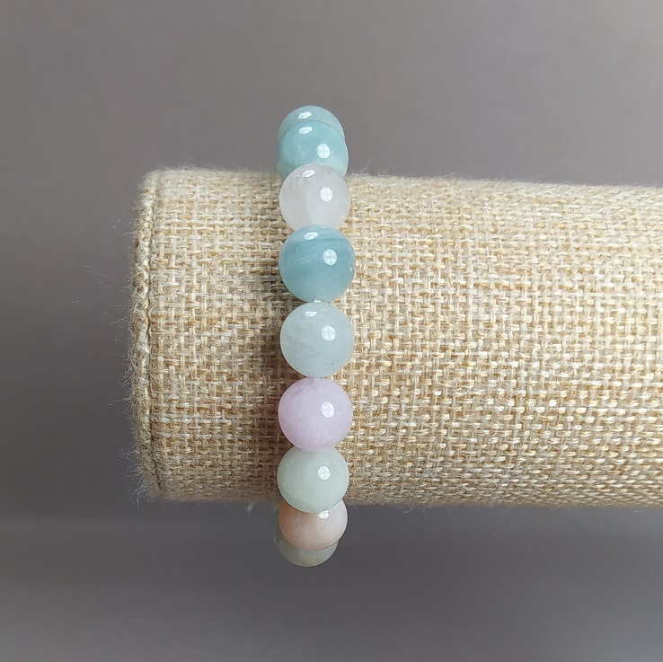 Bransoletka z naturalnego kamienia morganitu — gładkie kulki, średnica 10 mm, elastyczny obwód 18 cm