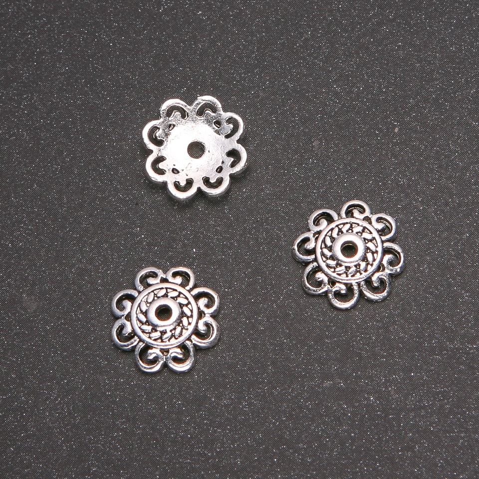 Końcówka z okuciami, średnica 13 mm, średnica wewnętrzna 7 mm, opakowanie 20 g +/- 17 szt.