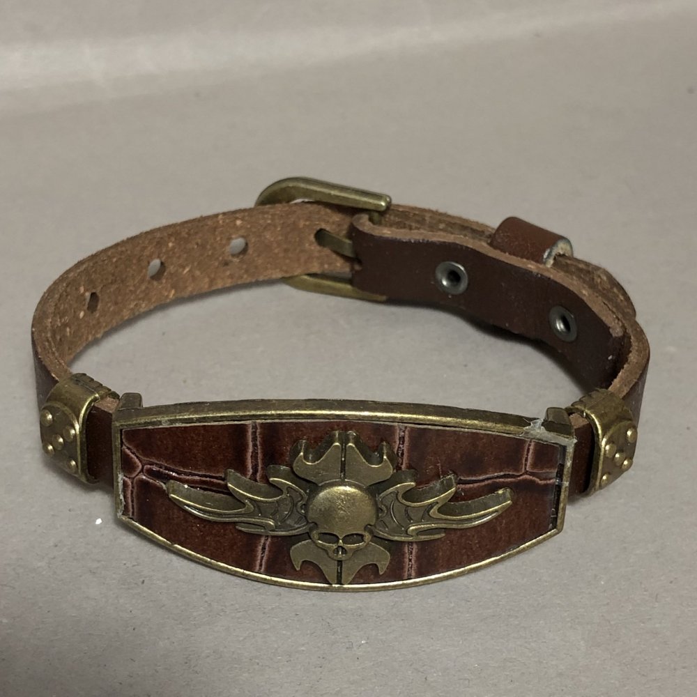 Bransoleta z metalowymi wstawkami, długość 16–24 cm, grubość 20 mm, ekoskóra, kolor brązowy, na pasku