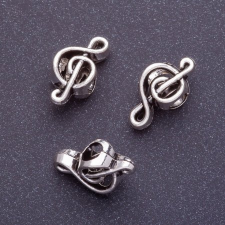 Koralik Pandora z motywem klucza wiolinowego, długość 18 mm, Ø 1–4 mm, kolor srebrny, fas. 20 g. +/- 11 szt.
