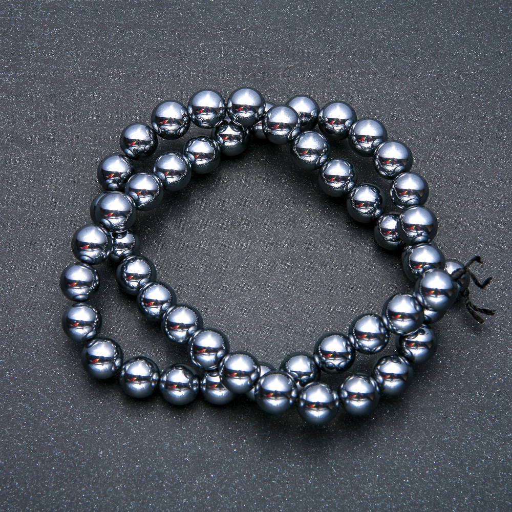 Koraliki z terahercu na nici, gładkie kule, średnica 10 mm, długość 39 cm