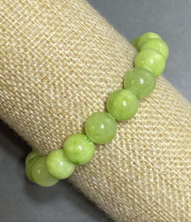 Bransoletka z onyksu na elastycznej gumce, gładkie kulki, średnica 10 mm, długość 18 cm