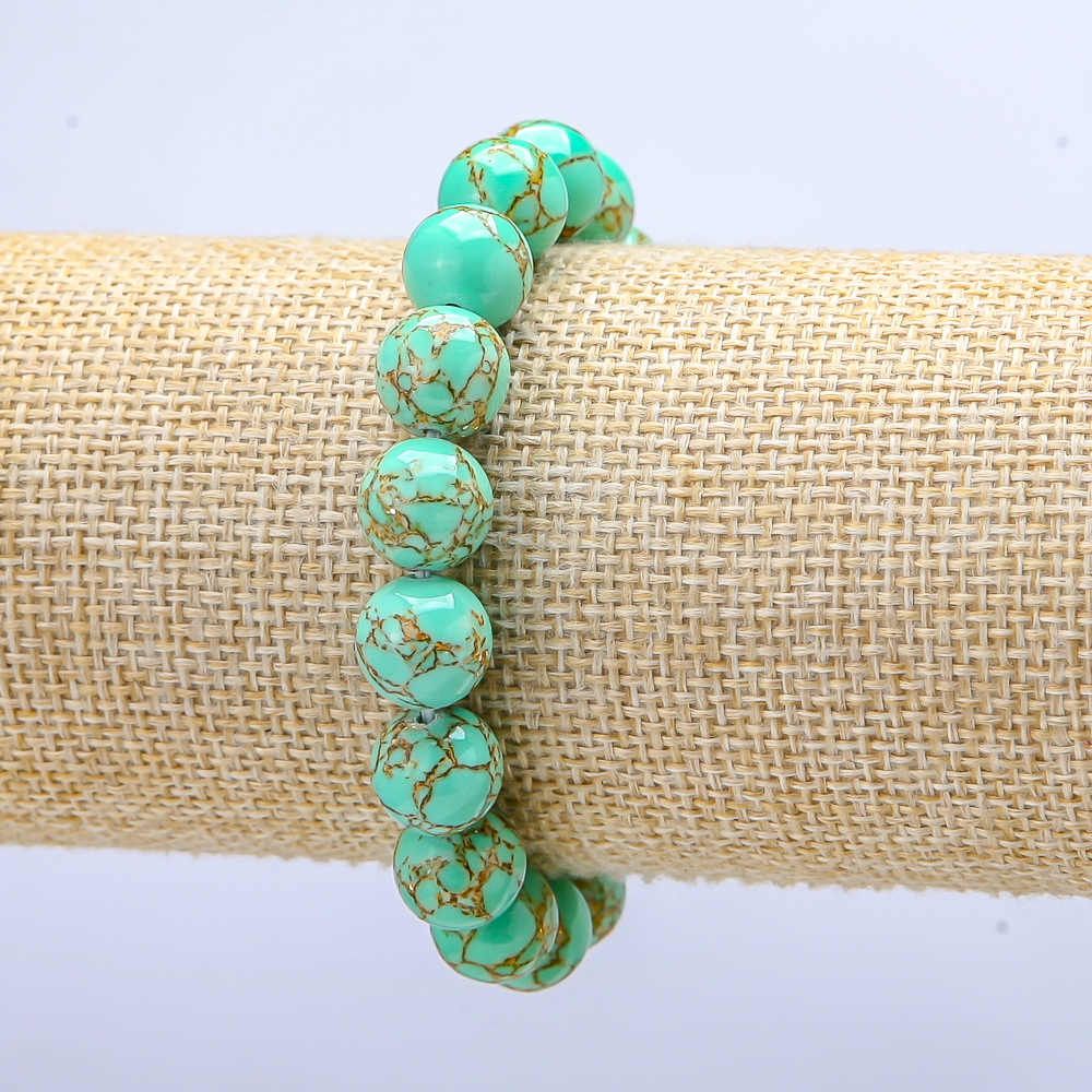 Bransoletka na gumce z zielonego jaspisu cesarskiego (prasowane) gładkie kulki, średnica 10 mm, długość 18 cm