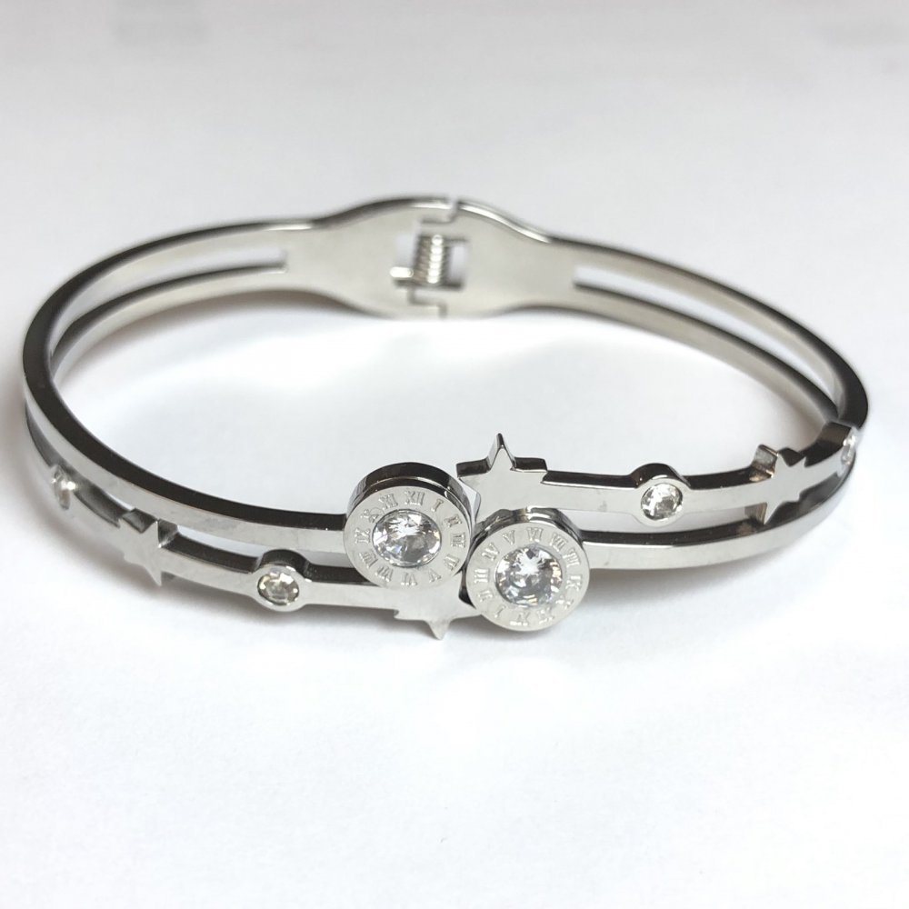 Bransoletka Xuping rhodiowana, grubość 5,5 mm, średnica 63×54 cm +