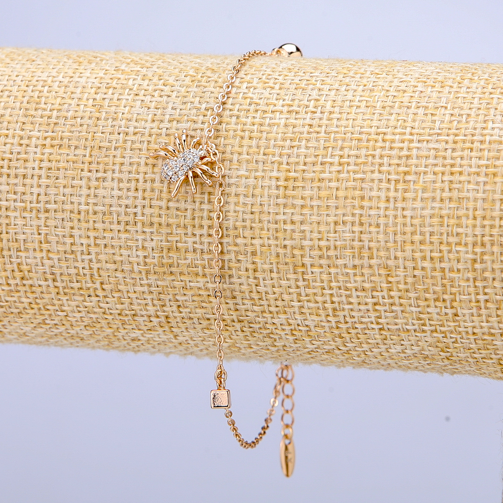 Bransoletka Xuping z pozłacaniem 18K z białymi kryształami, grubość 1 mm, długość 18–21 cm