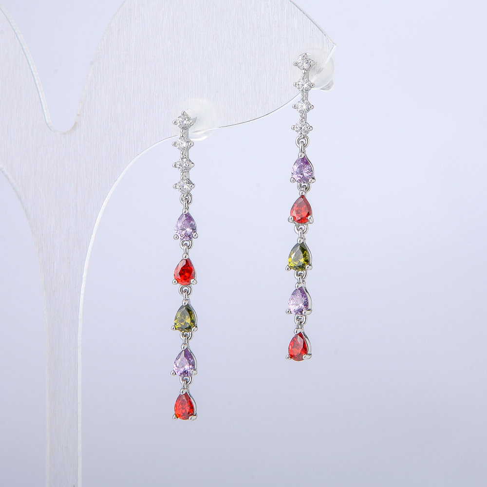 Kolczyki Xuping - kolczyki sztyfty w formie kuleczek rodowane z białymi cyrkoniami i kryształami, długość 42 mm +