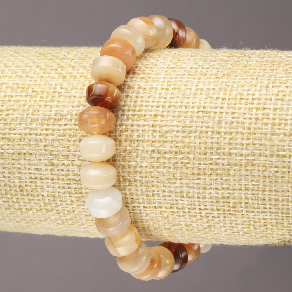 Bransoletka na elastycznej gumce z naturalnego kamienia karneolu — gładkie rondelki, średnica 9x7 mm+