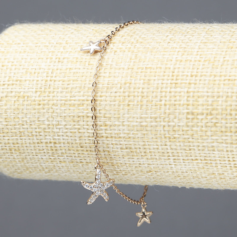 Bransoletka Xuping z pozłacaniem 18K z białymi kryształami, grubość 1,5 mm ±, długość 18–20 cm ±