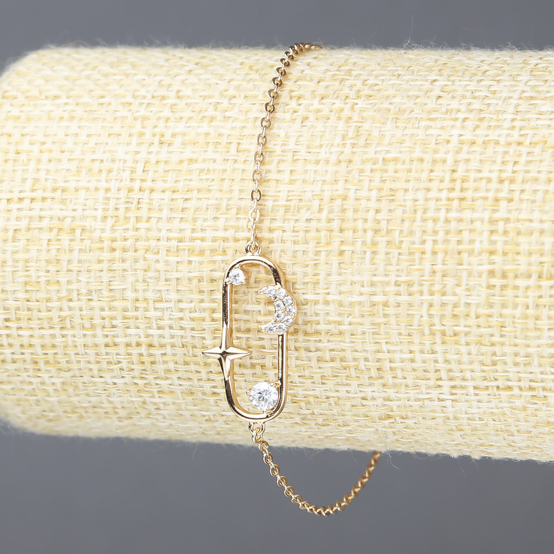 Bransoletka Xuping z pozłaceniem 18K i białymi kryształami