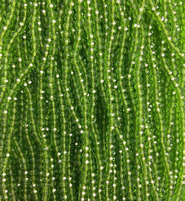 Koraliki czeskiego kryształu na żyłce, zielone, przejrzyste, fasetowane rondelki, średnica 3,5×3 mm, długość 34 cm +