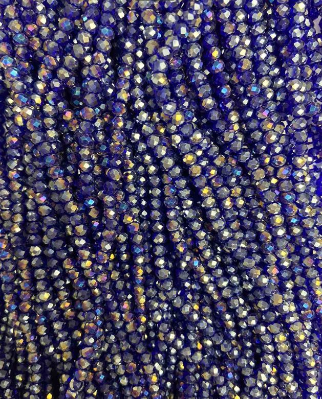 Koraliki czeskiego kryształu na żyłce, niebieskie z benzynowym napylaniem, fasetowane rondelki, średnica 3,5×3 mm, długość 33 cm