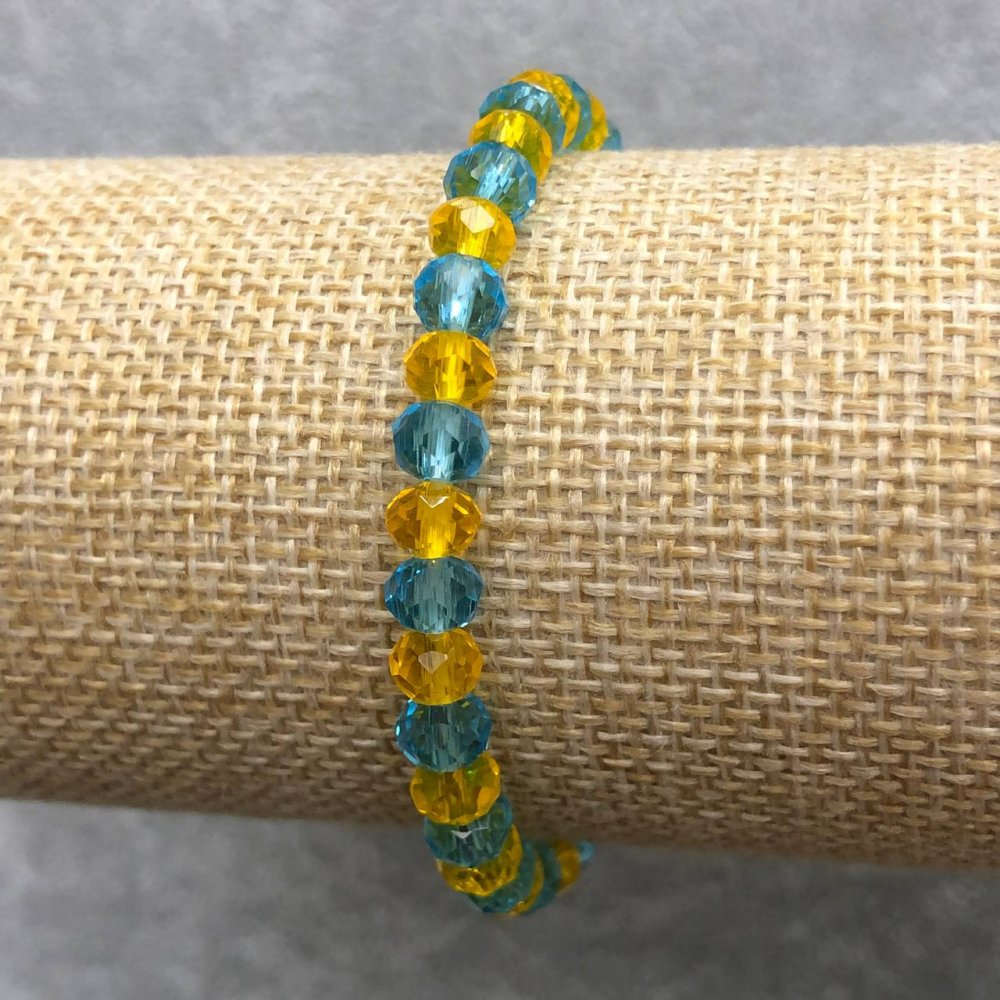 Bransoletka na gumce z czeskiego kryształu Ukraina fasetowany rondel, średnica 6×4 mm, długość 18 cm