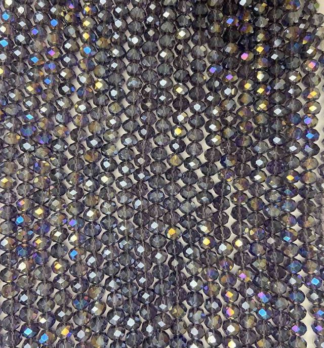 Koraliki czeskiego kryształu na żyłce, fioletowo-przezroczyste z napylaniem benzynowym, fasetowane rondelki, średnica 8 x 6,5 mm, długość 40-42 cm