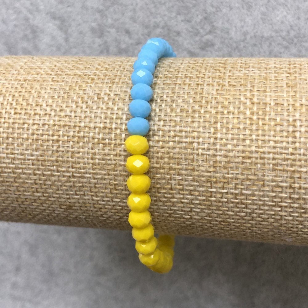 Bransoletka na gumce z czeskiego kryształu „Ukraina” fasetowane rondelki, średnica 6×4 mm, długość 18 cm