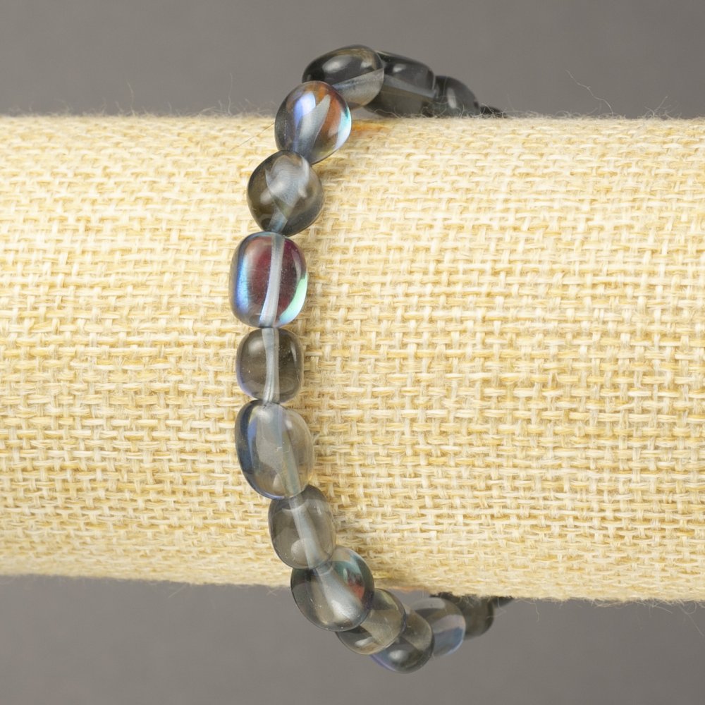 Bransoletka na gumce z opalowego szkła, błękitna fasetowana 10×8 mm+