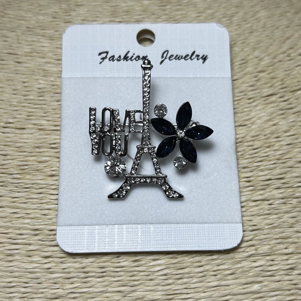 Broszka «Paryż» – srebrzysty metal, kryształy i niebieskie cyrkonie 40×35 mm +