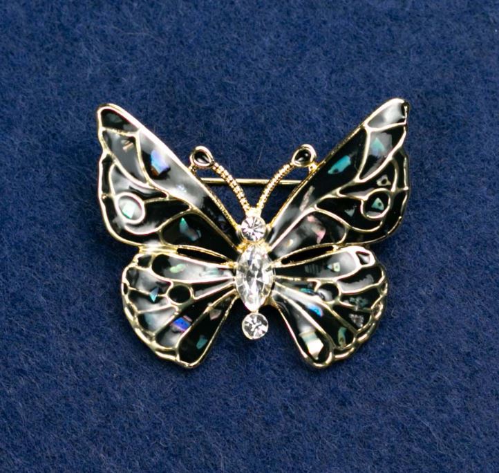 Broszka „Motyl” z białymi cyrkoniami, ciemnoszarej emalii z haliozytu, złoty kolor metalu 37×32 mm